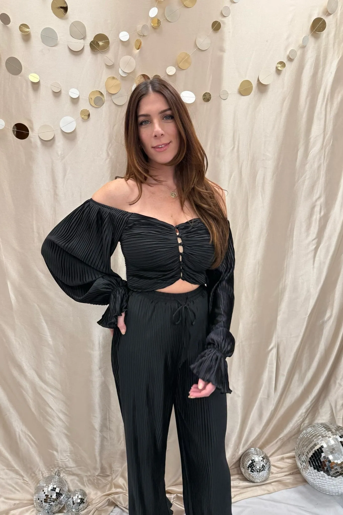 struck midnight black pleated blouse